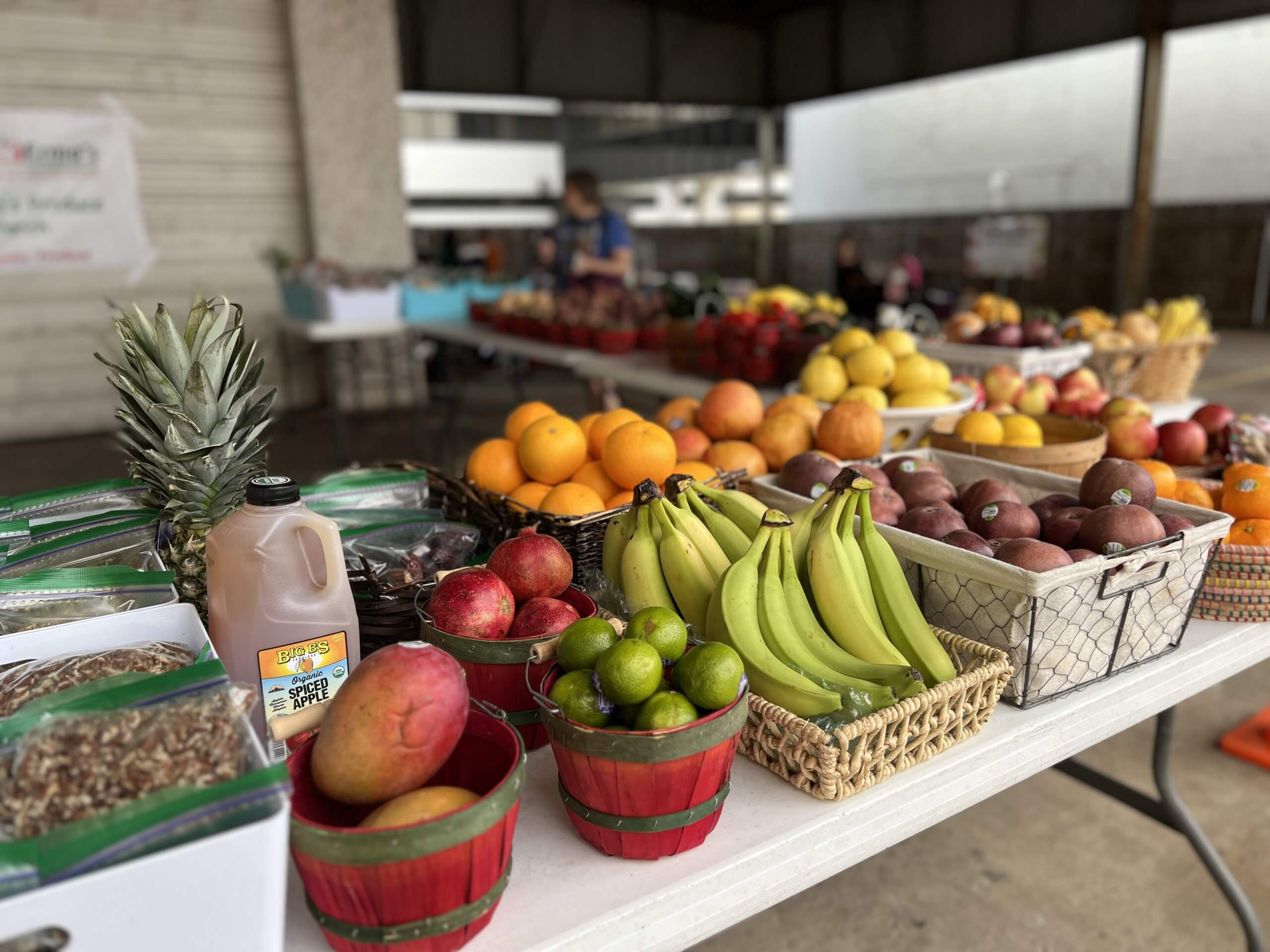 A healthy and bright-looking array of fruits is seen at one of the vendor booths found at the Nassau Farmer's Market in the Bay Area of Houston, TX.